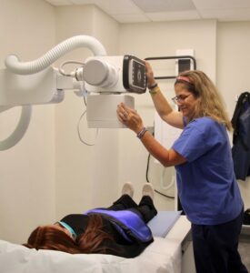 Patient receiving X-ray imaging in a modern diagnostic facility